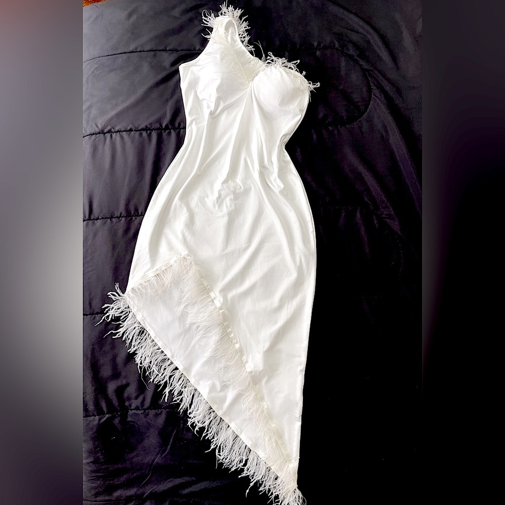 White dress with feather one shoulder